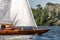 Classic sailing yacht with spinnaker on a lake in a regatta