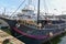 Classic ships moored at the quays of Stockholms Old Town