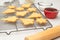 Classic Shortbread cookies with raspberry preserves recipe. Cookies close up on cooling rack