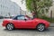 Classic small sporting car convertible Mazda MX-5 parked