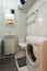 Classic small toilet with washing machine and washbasin