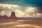 Classic southwest desert landscape under a dramatic sunset in Monument Valley in Arizona