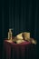 Classic still life with golden toilet paper, face mask and antiseptic for hands