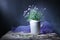 Classic still life jug with blue flowers forget me not decorative picture. Art Photography. Greeting card. Text free space. Blue b