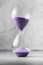 Classic Style Vintage Old Hourglass Sandglass Clock. A sandglass, modern hourglass or egg timer showing the last second or last