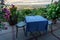 Classic terrace furniture with beautiful view of city Pecs in Hungay with two wine glasses on the table romantic outdoor setting