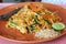 classic Thai dish of fried rice noodle with vegetables and aromatic sauce