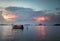 Classic Thailand sunset view with long tail boats