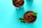 Classic tiramisu in glass on blue background. Italian dessert. Selective focus