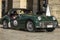 Classic triumph tr3 on the road during a race