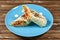 classic Turkish shawarma in a plate on a wooden background