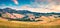 Classic Tuscan scene. Firsf sunlight glowing fields and hills. Colorful summer sunrise view of Italian countryside. Beauty of
