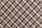 Classic tweed, Wool Background Texture. Coat close-up. Expensive men`s suit fabric. Glenurquhart check is made of woolen fabric wi