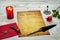 Classic Valentine`s Day cad with decorative quill and stand, red envelop with wax seal, red candle and rose, space for your text