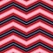 Classic vector seamless pattern with pink, white navy blue chevrons on a red background