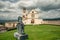 Classic view of famous Basilica of St. Francis of Assisi  in beautiful spring day light with dramatic clouds in the sky