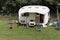 Classic vintage caravan set up for camping on a campsite