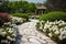 Classic and vintage pathway with green yard white rocks and flower bush