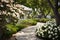 Classic and vintage pathway with green yard white rocks and flower bush