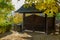 Classic vintage vintage retro wooden gates with roof. European architecture with oriental elements. Background