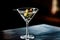 a classic Vodka Martini Gin cocktail served in a unique glass, garnished with plump olives.