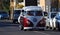 Classic VW Camper van being driven along street.