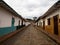 Classic white house walls and cobblestone streets in colonial historical village town of Barichara Santander Colombia