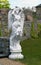 Classic white marble statue of a young lady angel