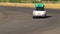 Classic white Porsche 911 traveling with luggage on roof