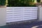 Classic white pvc plastic home gate portal of suburbs house door in city