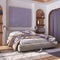 Classic wooden bedroom with master bed, parquet floor, niches and carpet in white and purple tones. Arched door with curtains and