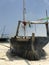 A classic wooden boat sits on the shores of Zanzibar, Tanzania