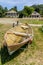 Classic wooden dinghy and colonial style houses