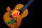 Classic wooden guitar with assorted roses