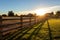 classic wooden ranch fencing in sunlight