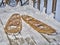 Classic wooden snowshoes in a backyard