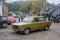 Classic yellow Polish car Polski Fiat 125p driving