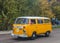 Classic yellow van camper VW T4 driving