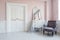 Classical armchair and mirror table at living room interior