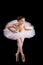 Classical ballerina in a white skirt