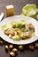 Classical Caesar salad with sliced chicken meat, cheese and fresh