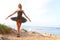 Classical dancer in front of the sea