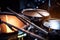 classical electronic drumsticks and drums, with dramatic close-up shot of instruments in action