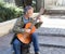 Classical guitar player in a Paris courtyard