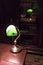 Classical lamp on the desk .