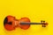 Classical music concert poster with orange color violin on yellow background with copy space