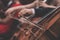 Classical music orchestra - double basses - close-up - suits - close-up on hands