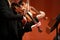 Classical music. Violinists in concert. Stringed, violinist.Closeup of musician playing the violin during a symphony
