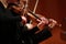 Classical music. Violinists in concert. Stringed, violinist.Closeup of musician playing the violin during a symphony