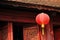 Classical red paper Chinese lantern in sacred shrine in Hanoi Vi